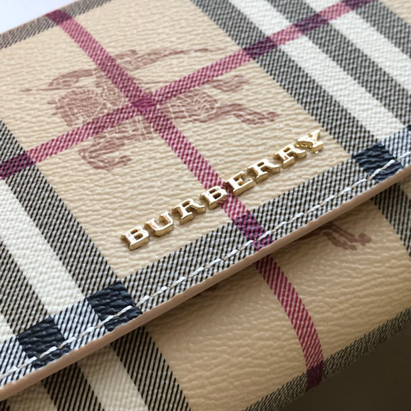 Гаманець Burberry Haymarket зі шкіри — фото 4