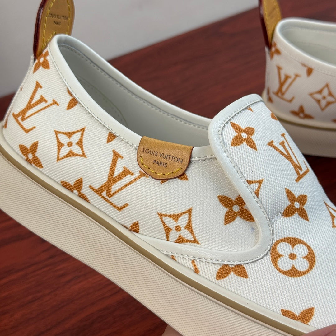 Сліпони з натуральної шкіри та текстилю Louis Vuitton LAGOON — білі