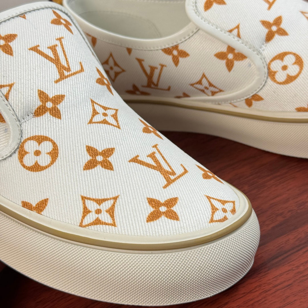 Сліпони з натуральної шкіри та текстилю Louis Vuitton LAGOON — білі