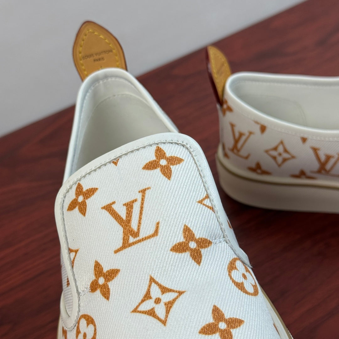 Сліпони з натуральної шкіри та текстилю Louis Vuitton LAGOON — білі