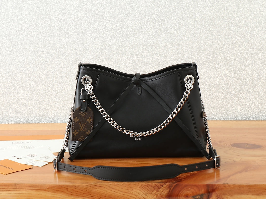 Жіноча сумка Louis Vuitton CarryAll