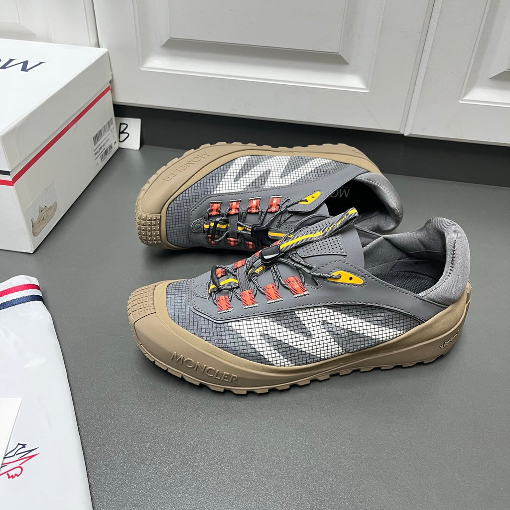 Шкіряні з текстилем кросівки Moncler Trailgrip LP — сірий